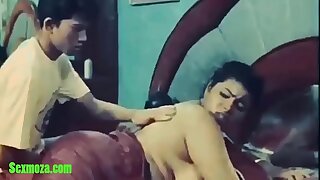 Indian son massages mother